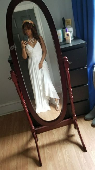 What do you think of my wedding dress?