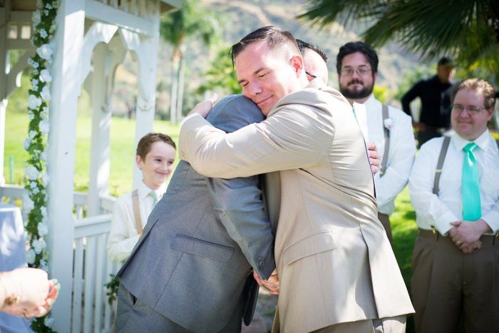 My husband hugs his new dad