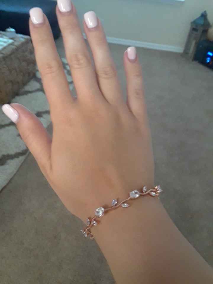 What jewelry is everyone wearing? - 1