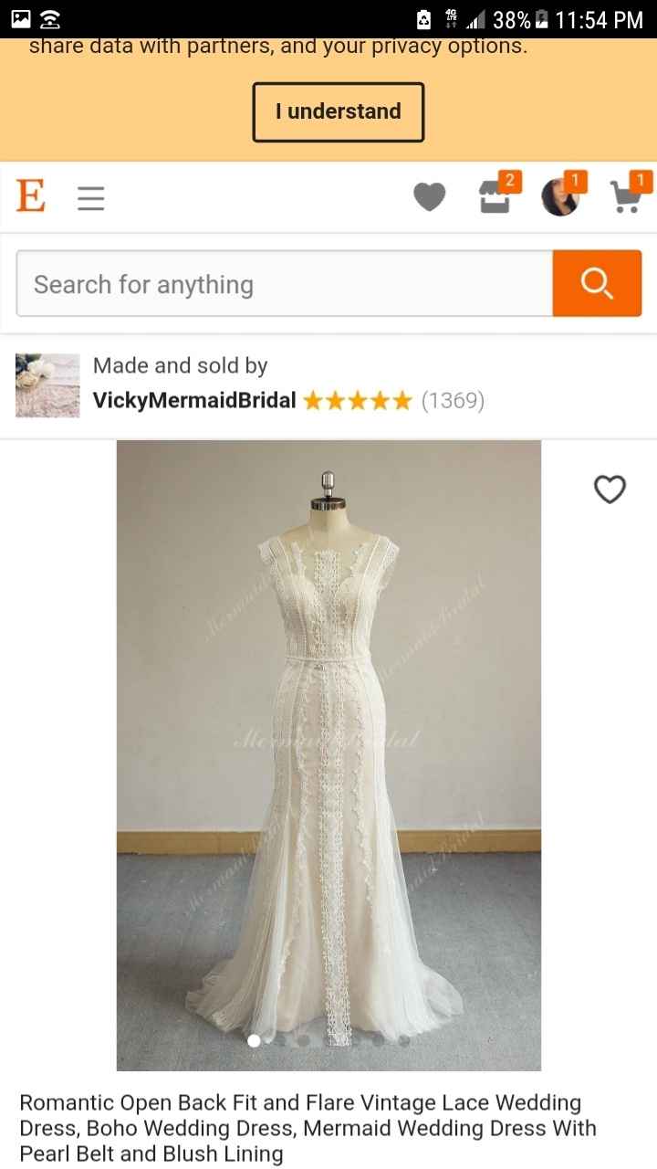 How much money did you spend on your wedding dress? - 1