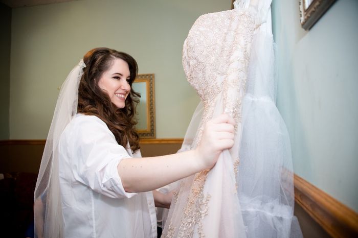 Getting ready to put the dress on
