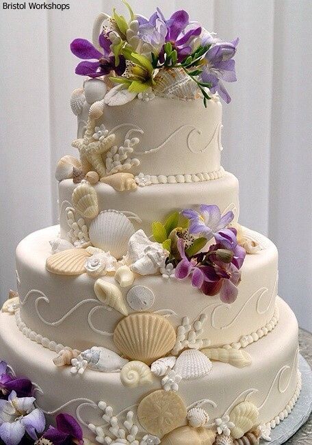 Cake toppers for sea shell/ beach themed wedding cake.