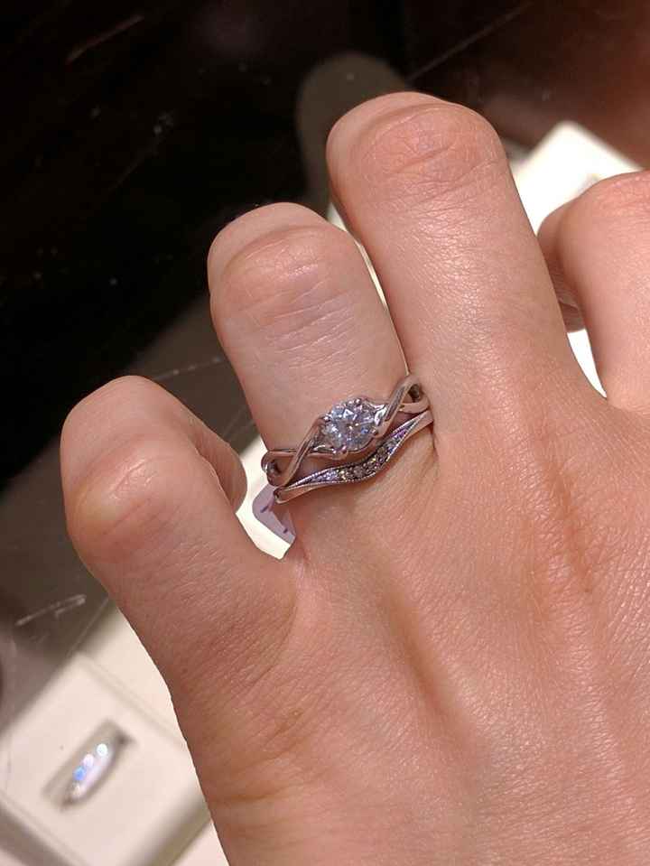 Does anyone have a twisted band diamond engagement ring? And what kind of wedding band did you get?
