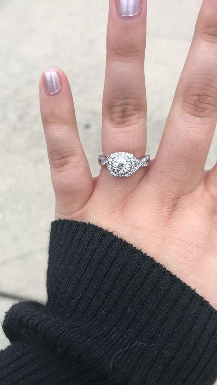 He finally proposed.... and I love my ring! What do you guys think?!?