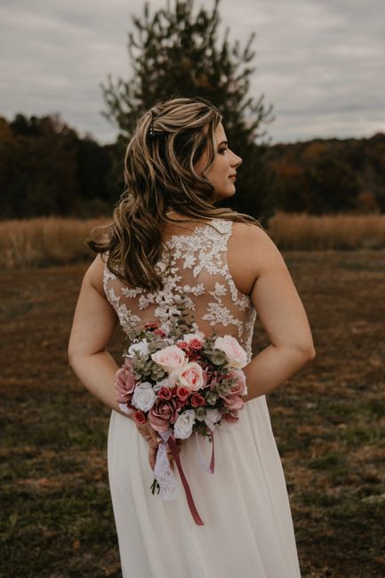 Wedding hair for a dress with a detailed back? - 1