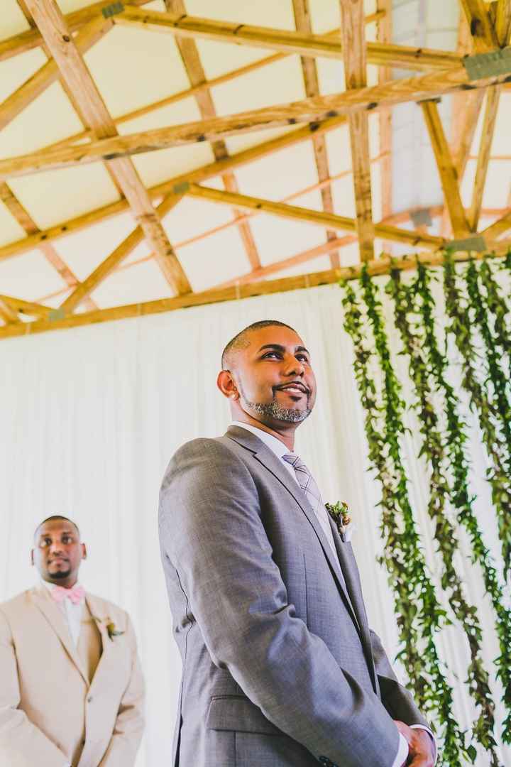 My super hot husband waiting for me at the end of the aisle