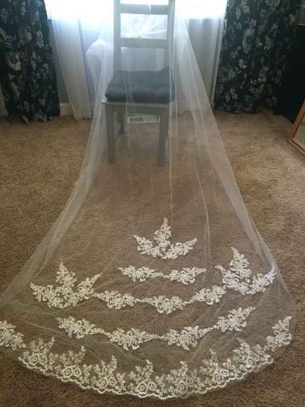 Where do you buy a Veil that does not cost as much as your dress!..Preowned is perfectly fine with m
