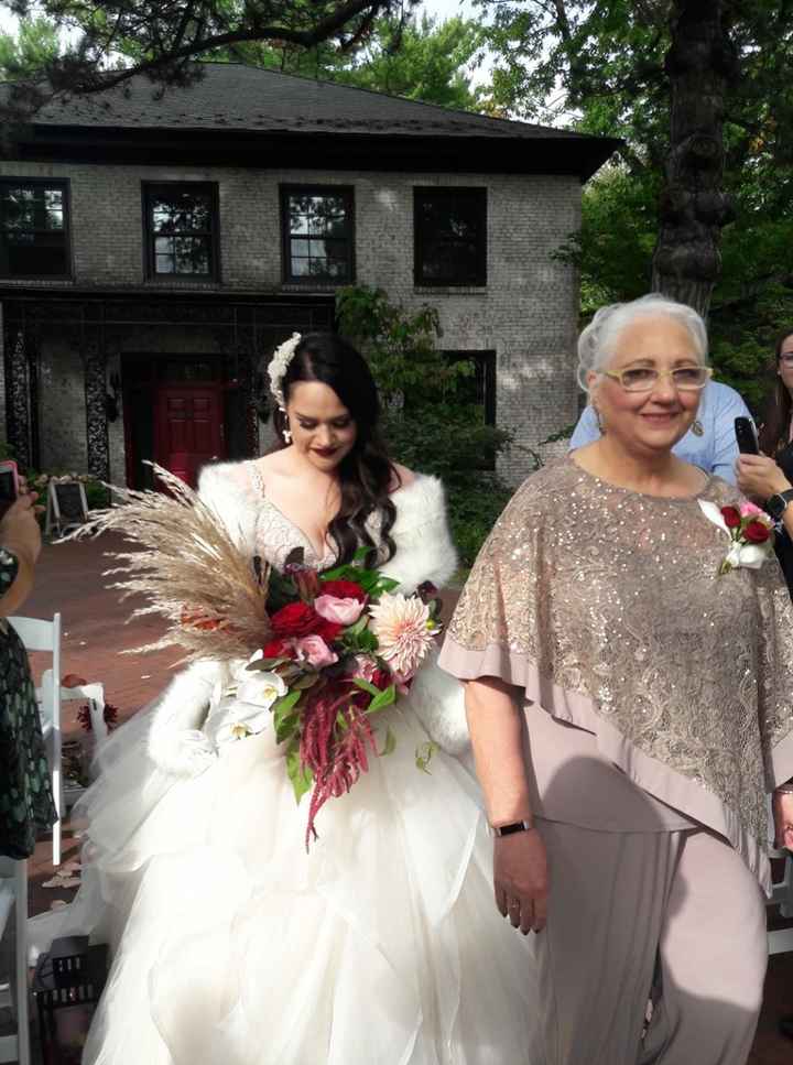 walking down the isle, escorted by my mother