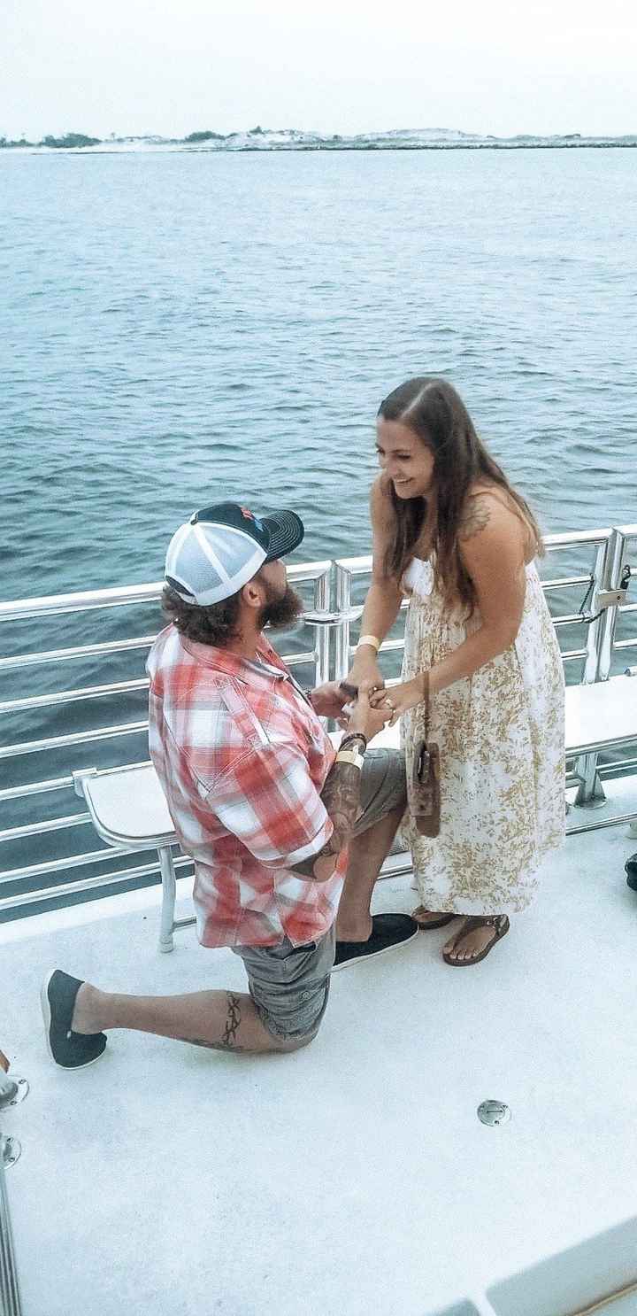 He proposed to me on a family vacation to Panama City, FL while we had our date night on a sunset sa