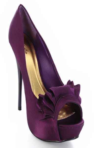 I showed my MOH my wedding shoes & she freaked out because they were purple......what color are you 