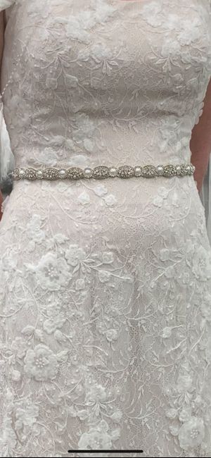 Show off your wedding belt. - 1