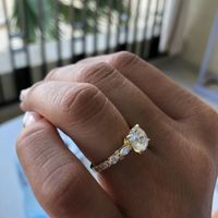 yellow gold band with marquise and round diamonds on the side