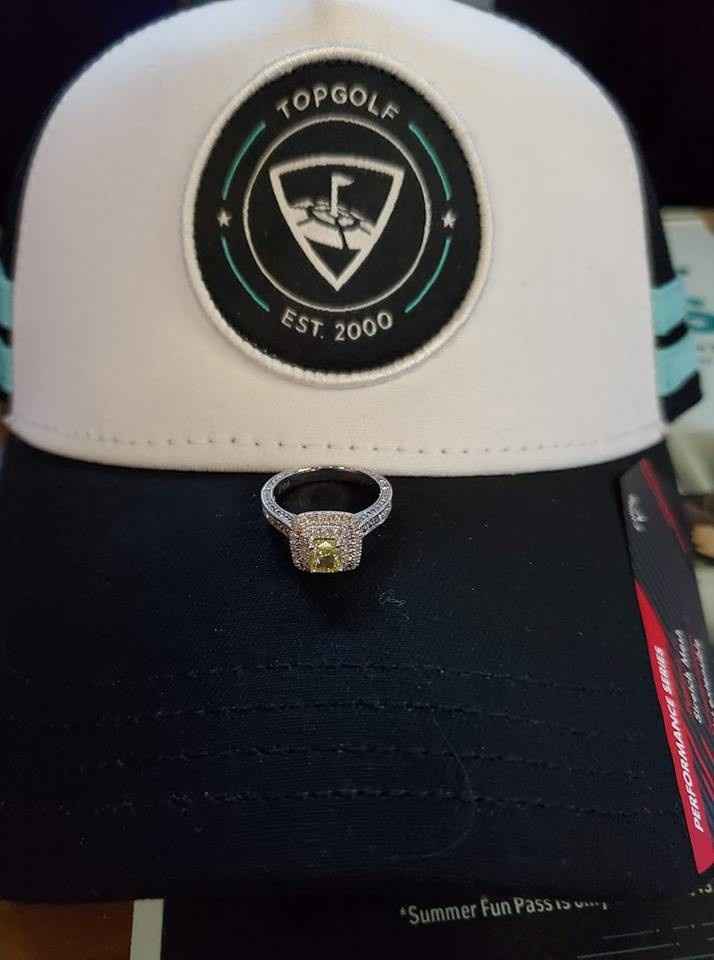 He proposed at Top Golf