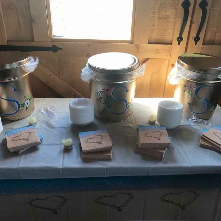 DH is from South Jersey, so his godmother made a table with Johnson's popcorn bins and salt water ta