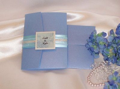 "Tropical" theme for reception... centerpeices decided, but not much more. Suggestions?