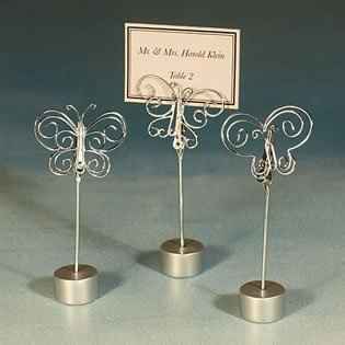 ANY IDEAS $ A BUTTERFLY THEMED WEDDING!!! HELP!!