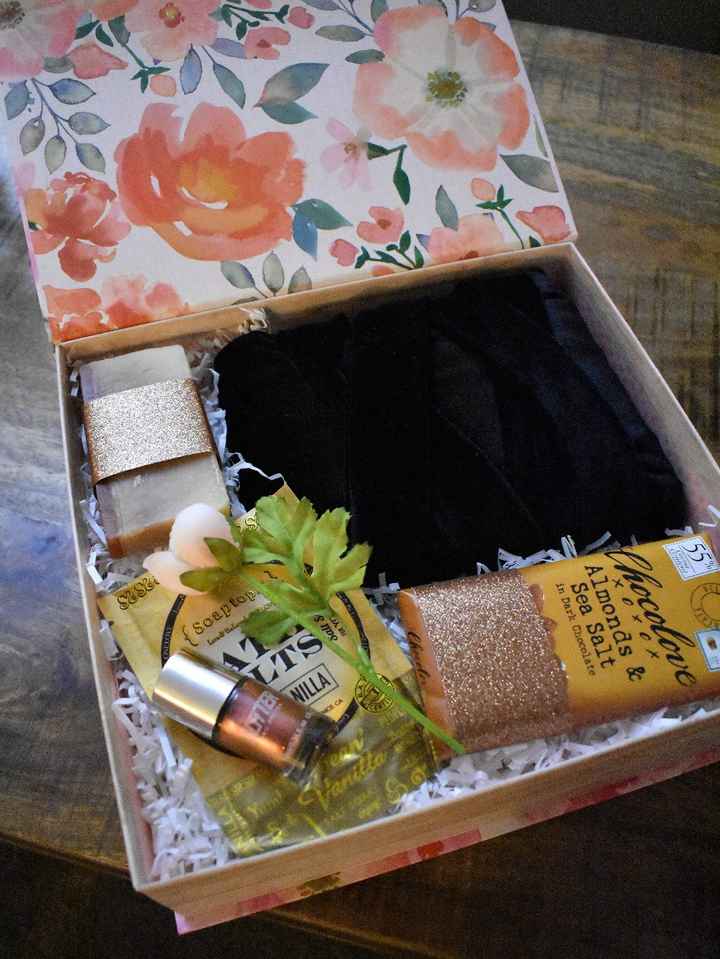 A black velvet robe, fancy bar soap and bath salts, copper nail polish and a chocolate bar