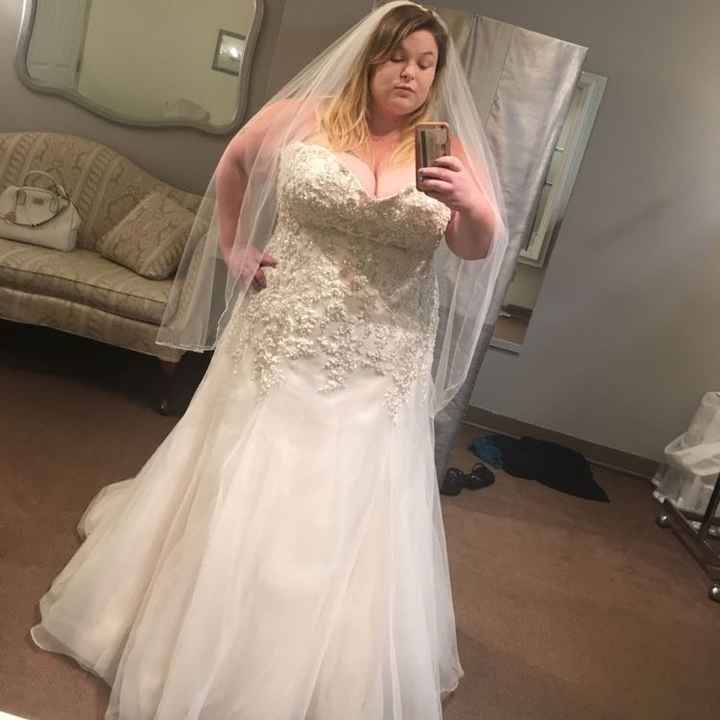 Dress and veil together. No words.