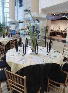 black satin table linens   gold chiavari chairs