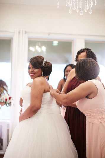 A couple of the girls trying to get me into this dress!