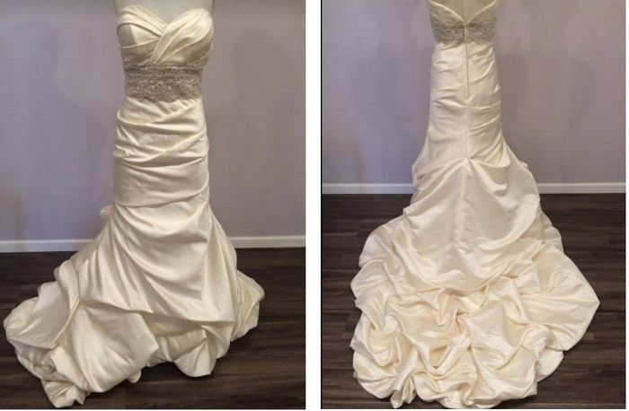My dress is champagne satin with a bubble hem and I only have one fitting left!!!  Can't wait!