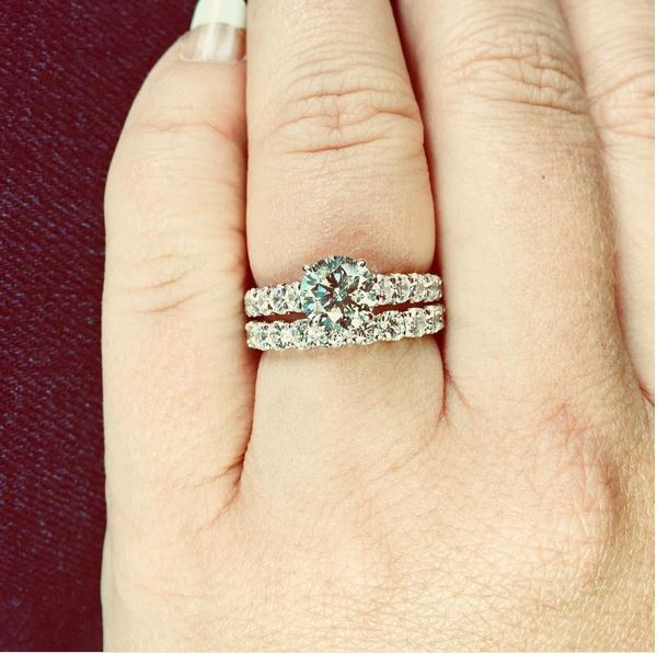 Rings! With a sneek peek of the wedding band with the engagement ring