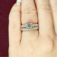 Rings! With a sneek peek of the wedding band with the engagement ring