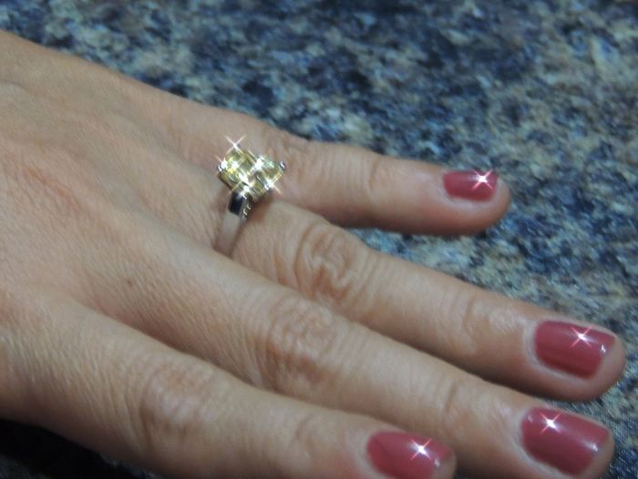 recently engaged, no ring?