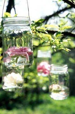 HELP!  My bride (I'm MOH) would like to do Mason/ Ball Jar Centerpieces. NEED SUGGESTIONS/ EXAMPLES!