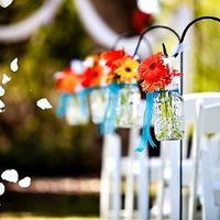 HELP!  My bride (I'm MOH) would like to do Mason/ Ball Jar Centerpieces. NEED SUGGESTIONS/ EXAMPLES!