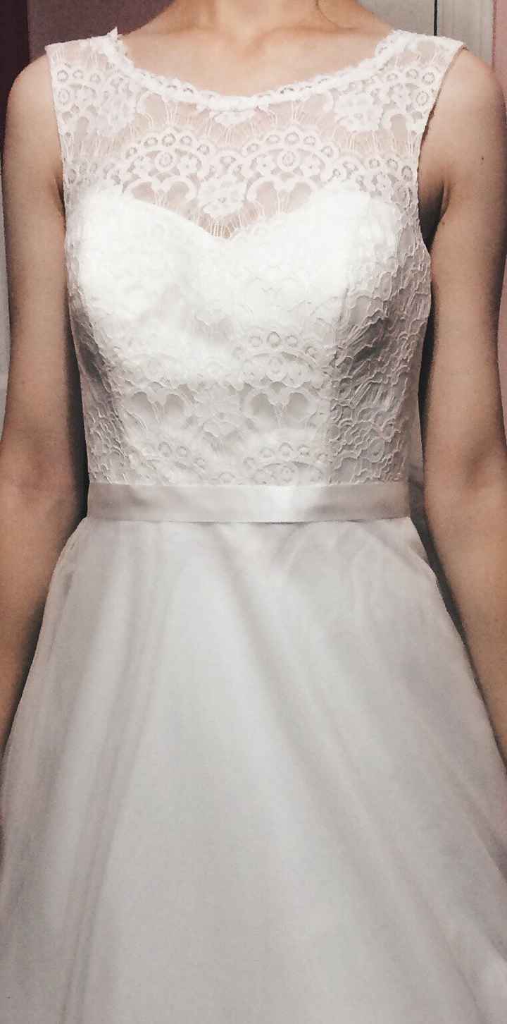 I'm a sucker for lace, so it was important for me to have some on my wedding dress