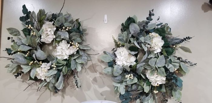 I built out using a neutral wreath base from Joanns, and added preserved eucalyptus, and faux hydran