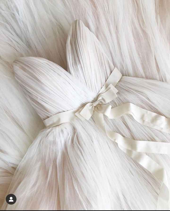 How many... dresses have you tried on? - 1