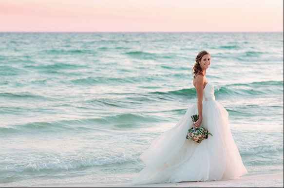 Is it okay to wear a ball gown wedding dress at a beach wedding?!