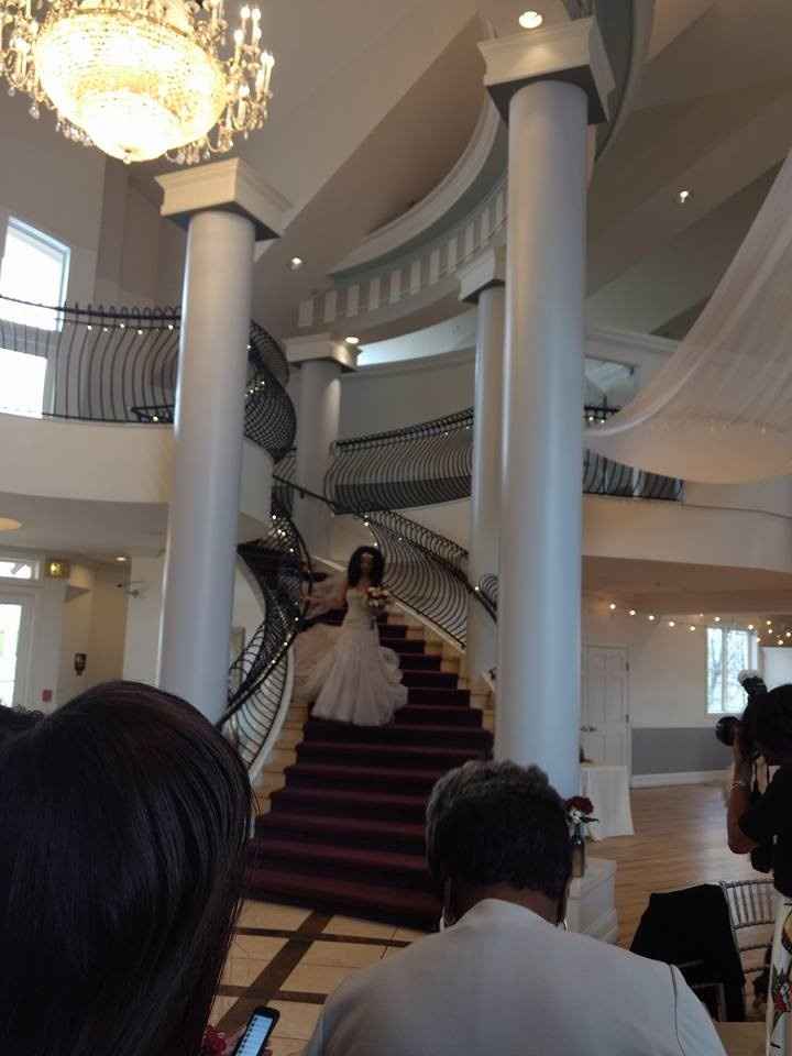 me coming down the staircase to the isle