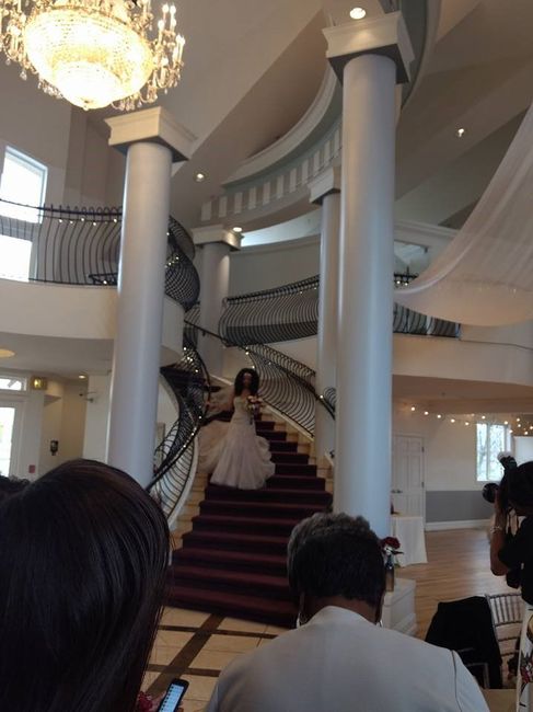 me coming down the staircase to the isle