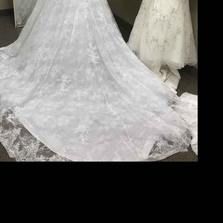How much money did you spend on your wedding dress? - 3