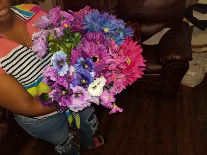 i so love the dollar tree. i was able to find 10 different flowers in my color scheme and a few othe