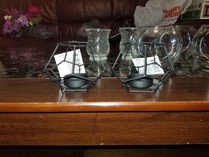 i so love the dollar tree. i was able to find 10 different flowers in my color scheme and a few othe