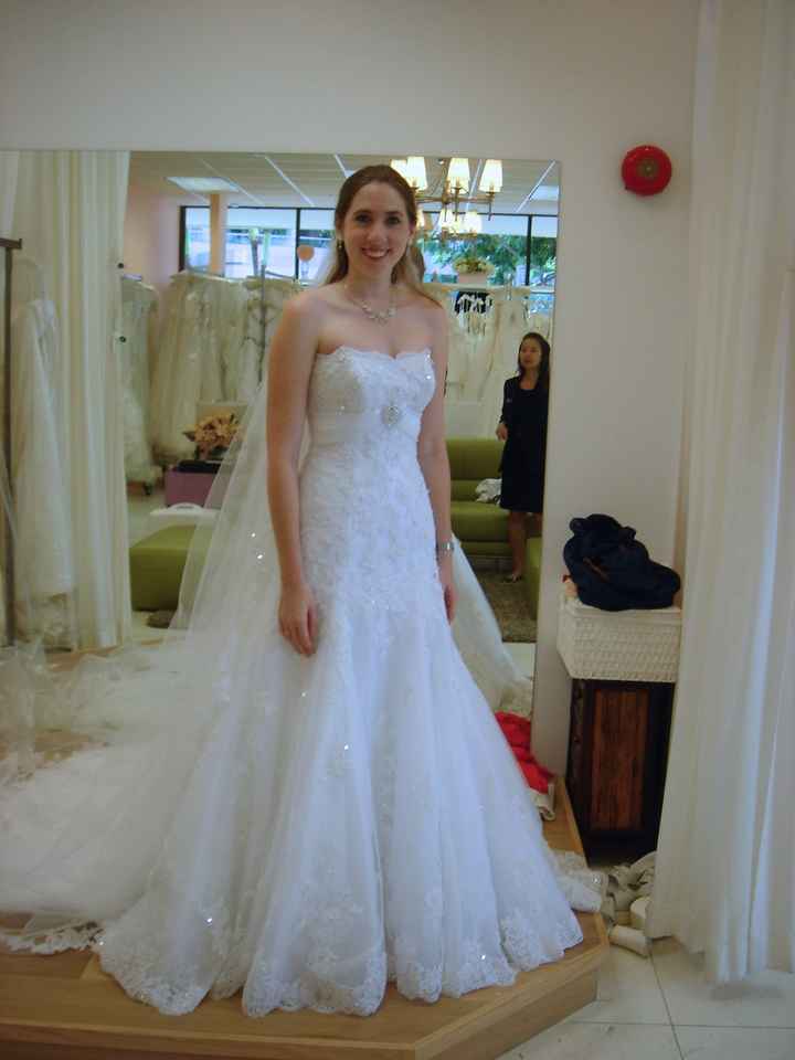 It's a rainy day here on the East Coast, I'm in need of sunshine.  So show me your wedding dress