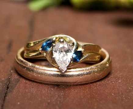 Anyone have blue sapphires in their wedding band?