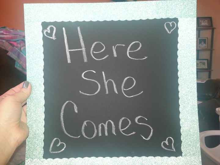 DIY "Here She Comes" chalk sign.