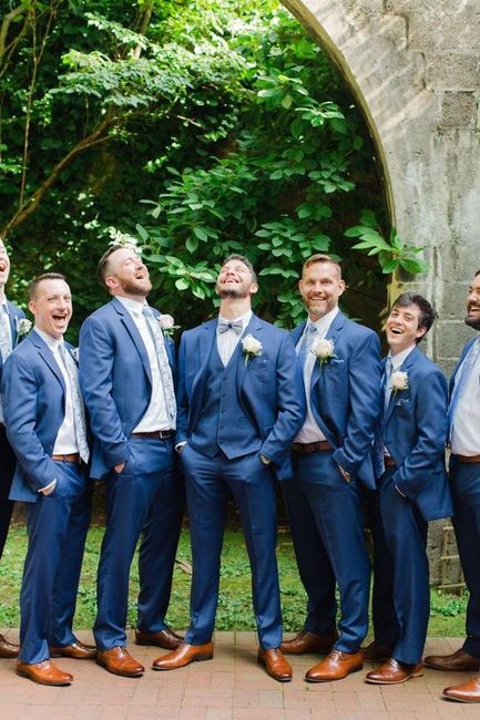 What color groom and groomsmen suits will coordinate with the bridesmaids dresses? 7