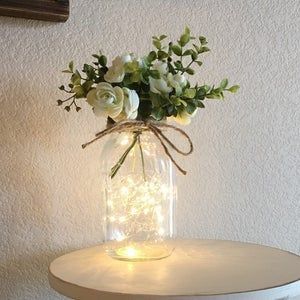 Fairy light in centerpieces with fresh flowers 1
