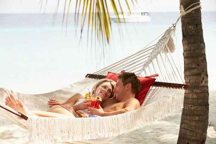 Honeymooning Bride and Groom in Beach Hammock