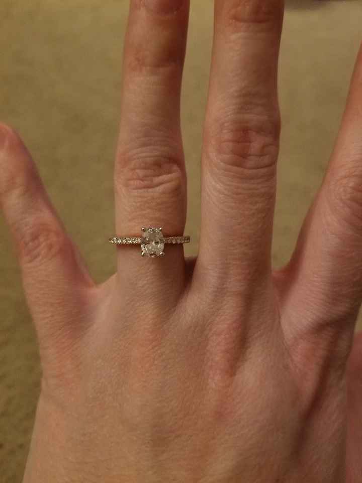 Who has a rose gold ring? - 2