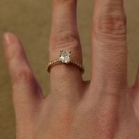 Who has a rose gold ring? - 1