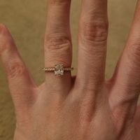 Who has a rose gold ring? - 2