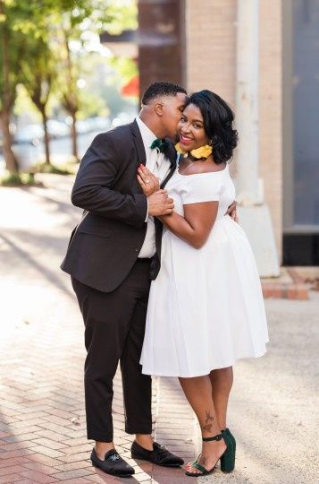 Engagement Pictures Kissing on the Cheek