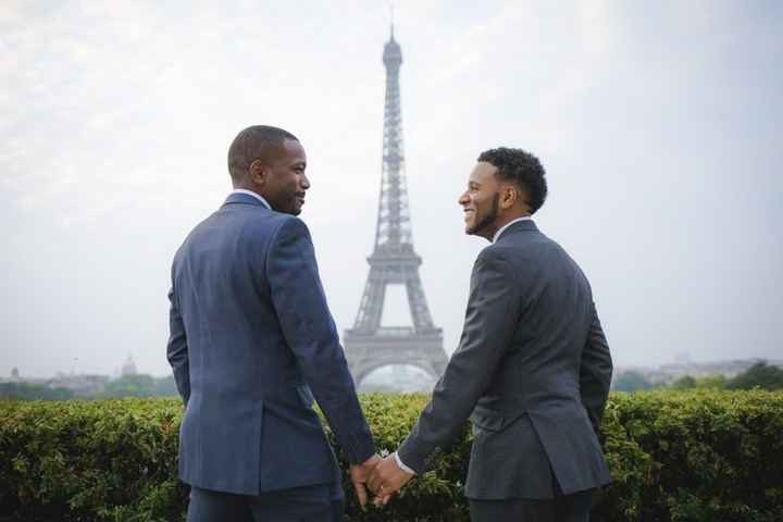 Parisian African-American Gay couple in front of the Eiffel Tower